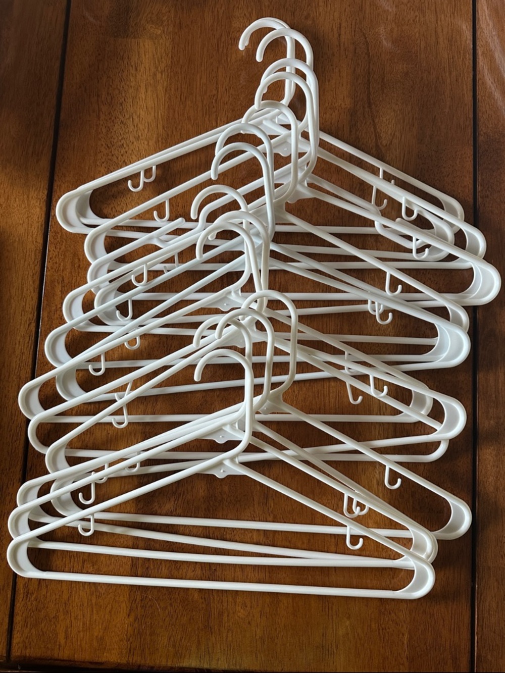 Upgrade your closet with this set of White  Hangers - Multipack 15ct